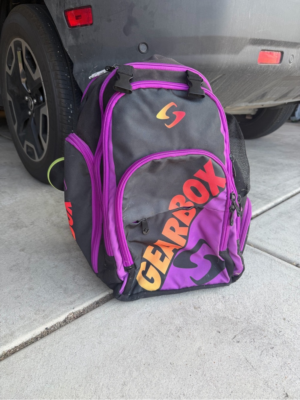 Men's Black and Purple Backpack with Orange Accent